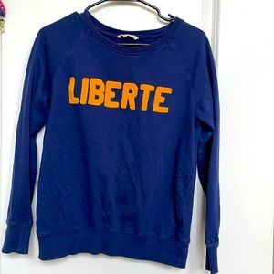 Blue sweat shirt